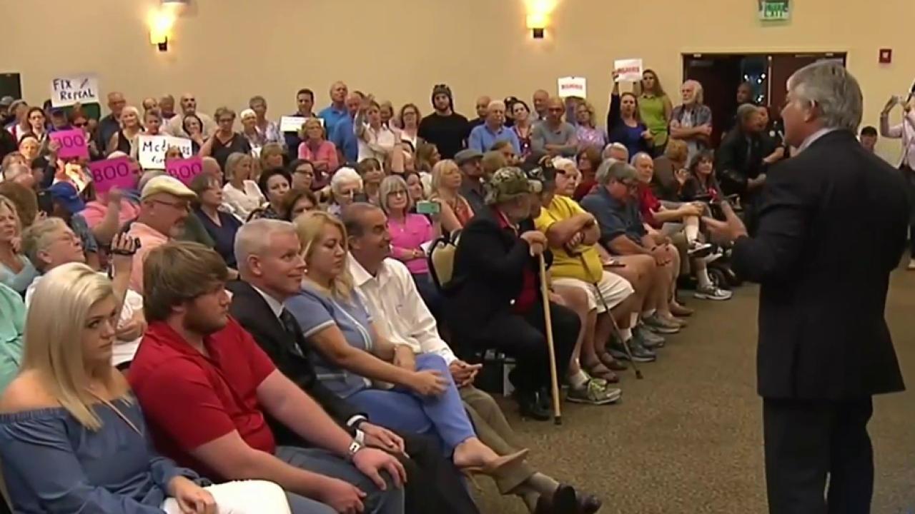 Thousands Demand Answers From Lawmakers at Town Halls Across the U.S.