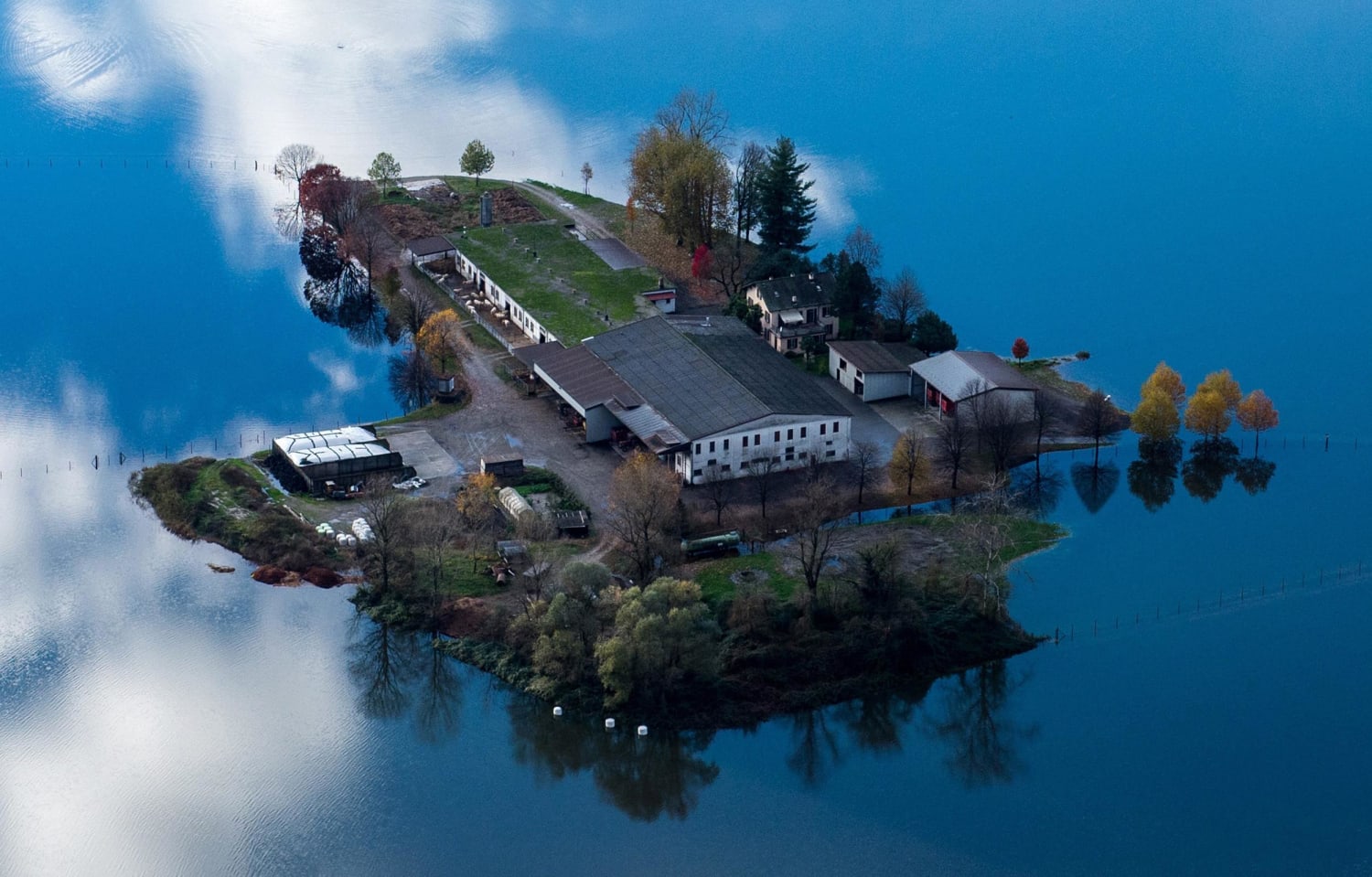 Floodwaters Surround Swiss Farm - NBC News