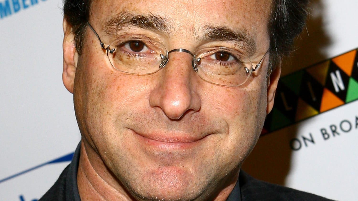 Bob Saget points out his resemblance to this company's logo