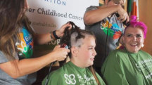 Moms opt for buzz cuts to fight childhood cancer