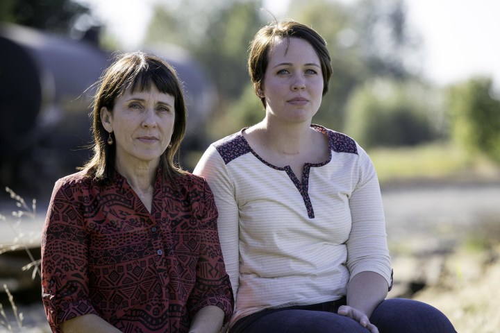 Image: Suzanne Swarthout sits with her daughter Jordan Swarthout in Bonney Lake, Wash