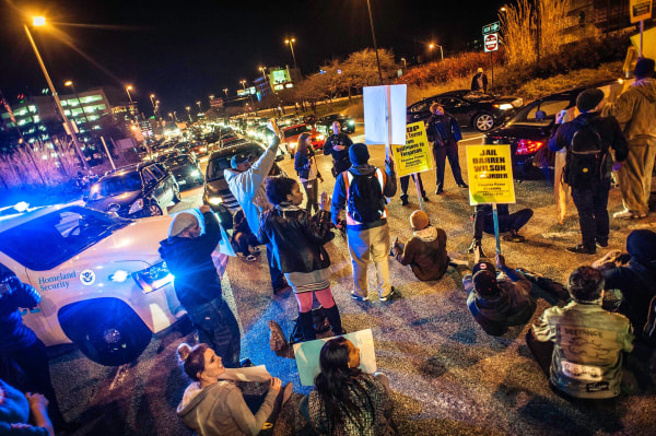 Image: Protesters came out en masse for peaceful demonstrations as they blocked traffic on the Jones Falls Expressway, one of the main arteries out of downtown in Baltimore