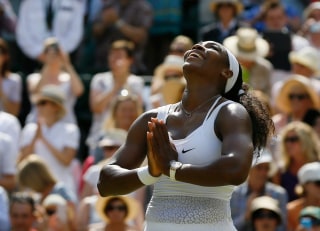 Image: Serena Williams of the United States celebrates winning the singles match