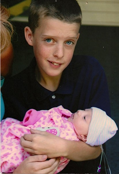 Salchert's son, Andrew, now 16, with Emmalynn.