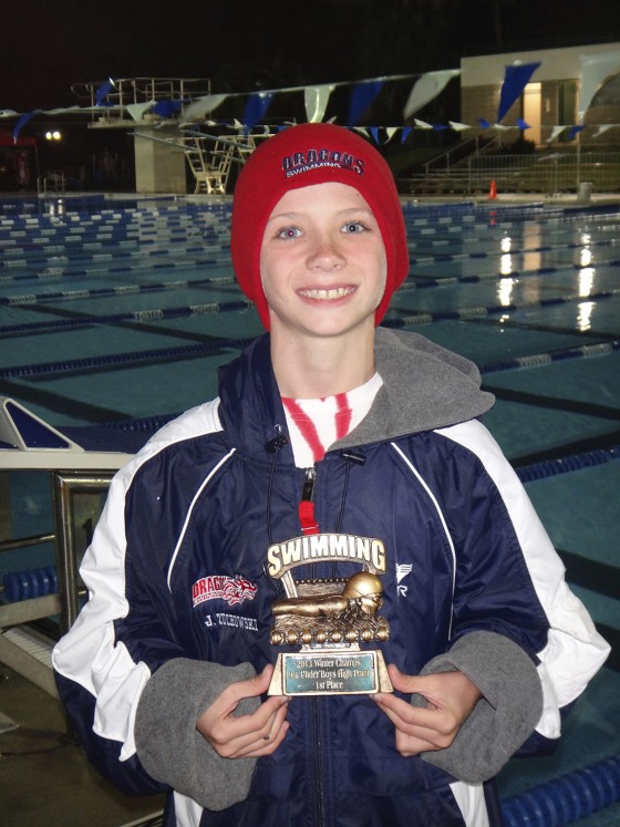 Before the swim meet began, Josh Zuhowski planned on winning five gold medals and the trophy as the top point-getter and giving them to friendly rival Reeze Branzell. 