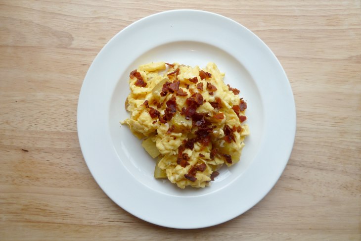 Scrambled eggs with bacon and potato