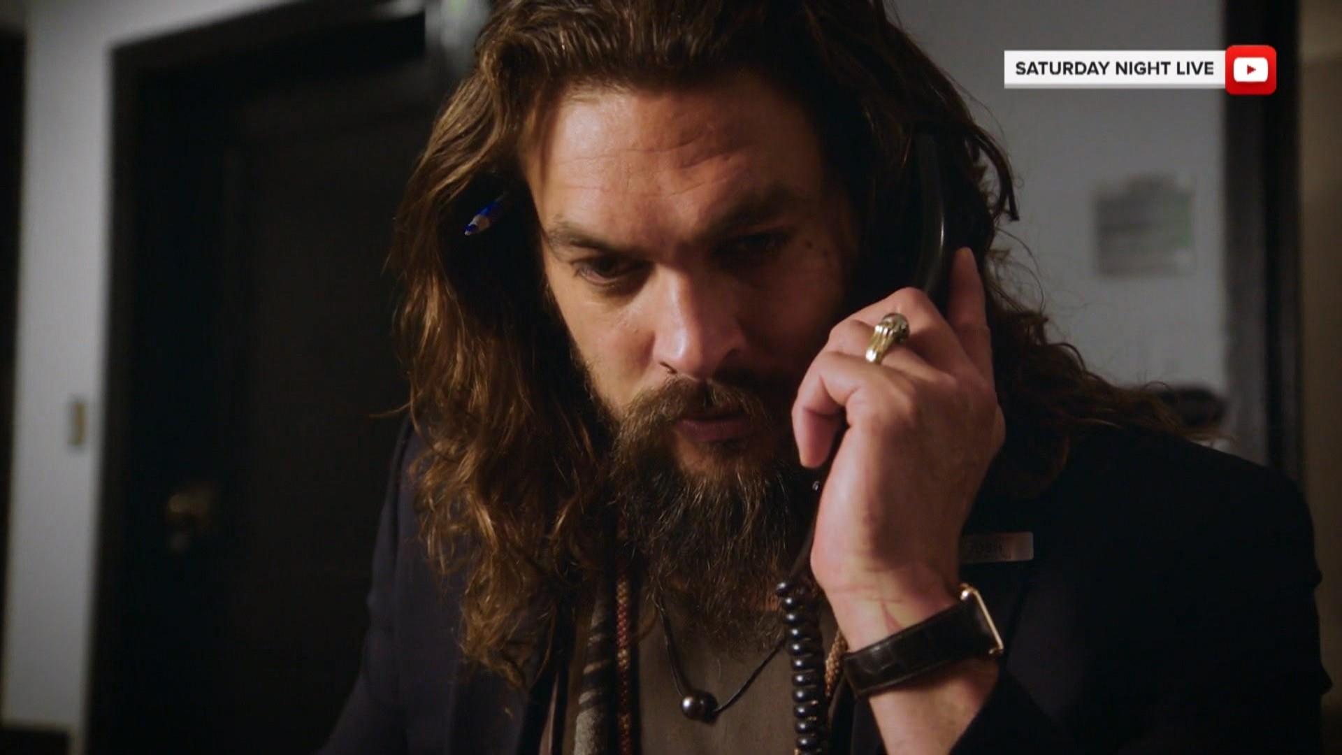 Jason Momoa is an action hero-turned-NBC page in 'SNL' promo
