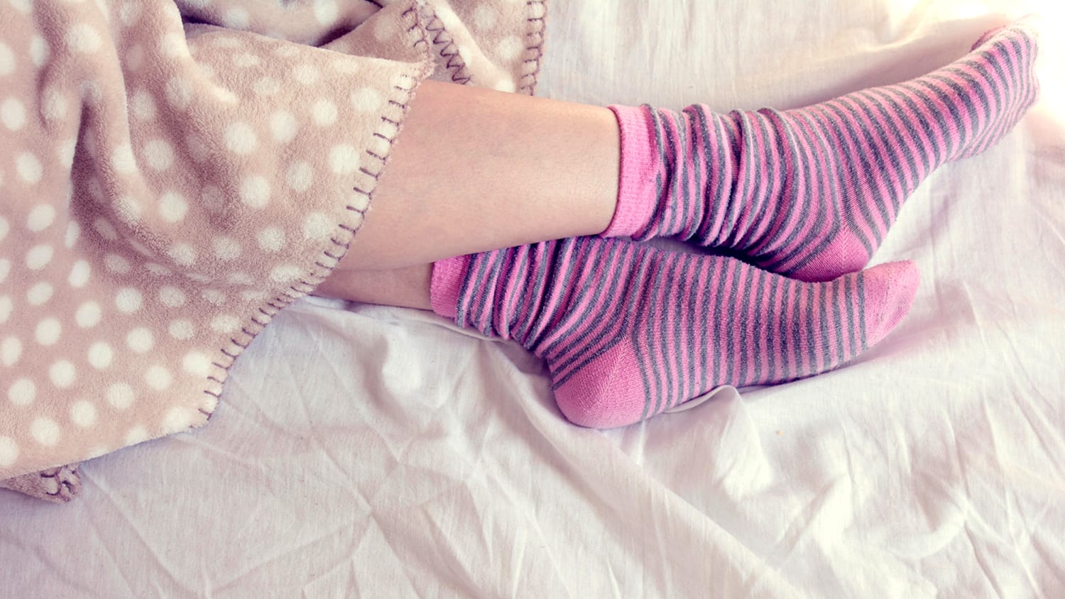 Wearing socks to bed is OK, and actually good for you