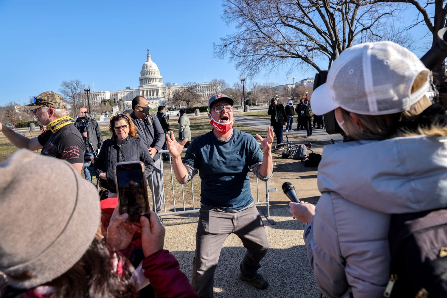 Dejected Trump supporters leave Washington, create new theories for Capitol violence