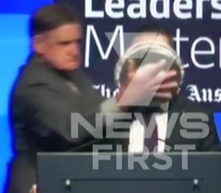 Airline Chief Gets Custard Pie in the Face as He Gives Speech