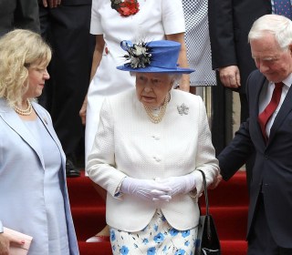 Queen Elizabeth Given a Helping Hand, But Did Royal Protocol Get Squeezed Out?