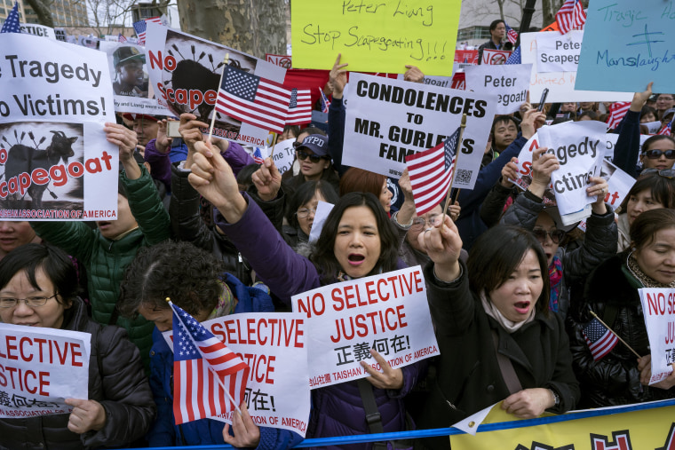 Image: Protesters attend a rally in the Brooklyn borough of New York Saturday, Feb. 20, 2016, in support of a former NYPD police officer Peter Liang