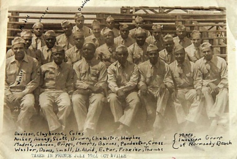 George Davison scrawled the names of his buddies from the 320th on this snapshot taken in Octeville, France in July 1944. Davison noted his place in the back row.