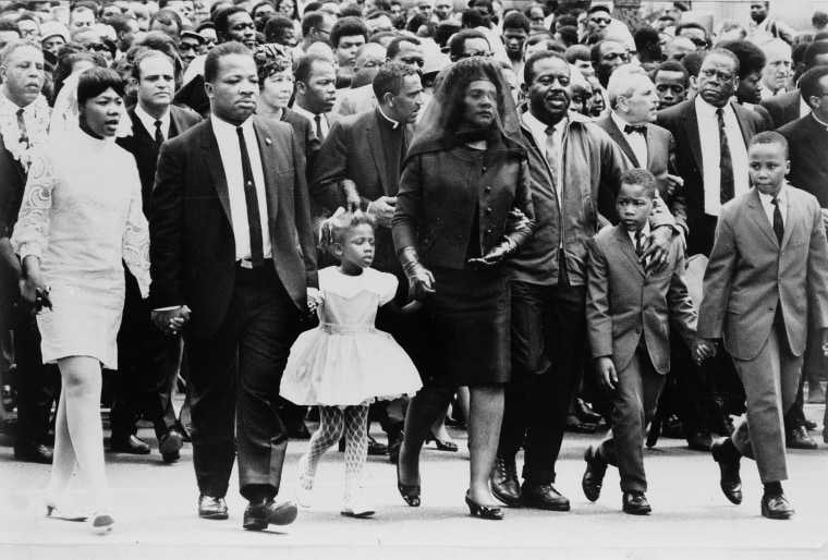 Image: The family of Dr. Martin Luther King, Jr. walk in the funeral procession of the slain civil rights leader