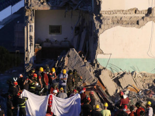 Building Collapse in Naples, Italy: 8th Body Pulled from Rubble