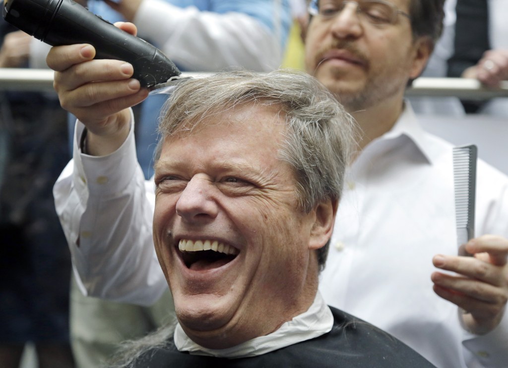 Image: Charlie Baker buzz cut during fundraiser