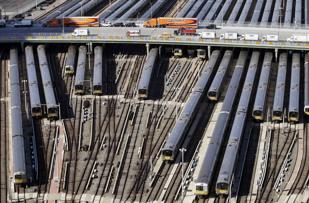 Image: Trains are parked in a rail yard on New York's west side