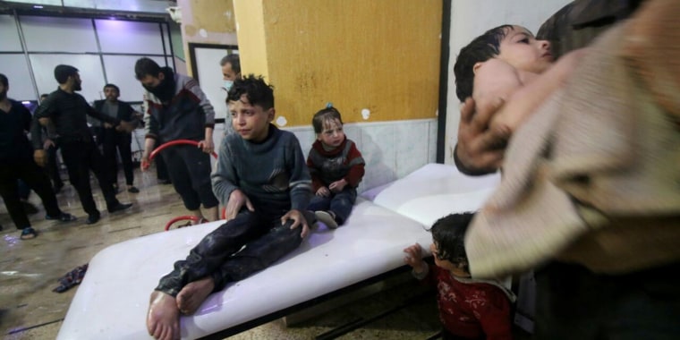 Image: Syrian kids wait to receive medical treatment after Assad regime forces allegedly conducted a poisonous gas attack on Duma, Eastern Ghouta in Damascus, Syria on April 07, 2018.