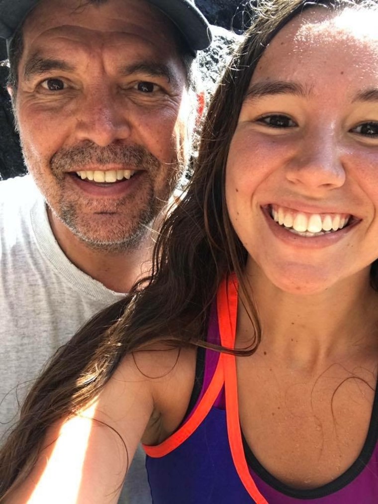 Mollie Tibbetts, right, with her father, Rob Tibbetts.