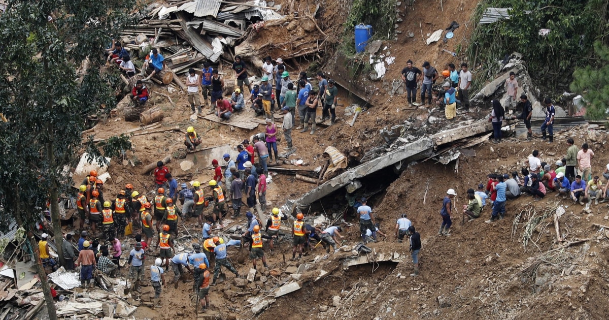 Dozens sheltering in chapel feared dead after huge landslide hits Philippines