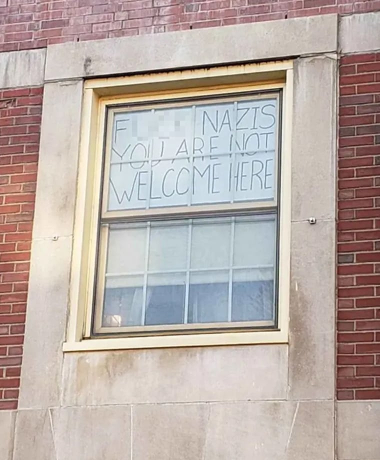 LOL: College student told to take down sign cursing at Nazis over 'issues of inclusion' 181225-nazi-sign-amherst-massachusetts-cs-220p_4c6fed403703d0e878fb6431498ae4cc.fit-760w