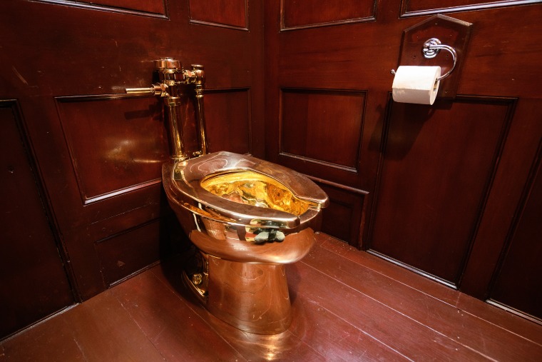 Solid gold toilet worth $1M and titled 'America' stolen from ...