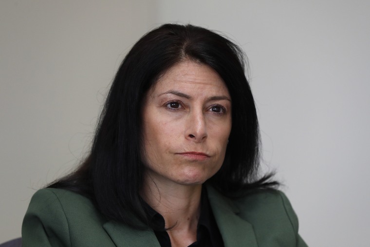 Image: Dana Nessel, Attorney General of Michigan, listens to a question from reporters in Detroit.