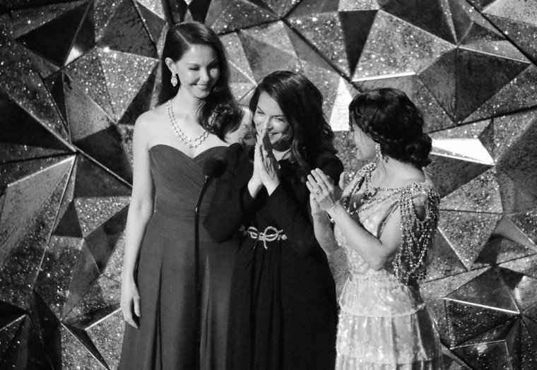 Image: Ashley Judd and Salma Hayek clap for Annabella Sciorra, center, at the 90th Academy Awards on April 3, 2018. All three actresses have spoken out about Harvey Weinstein's alleged sexual misconduct.