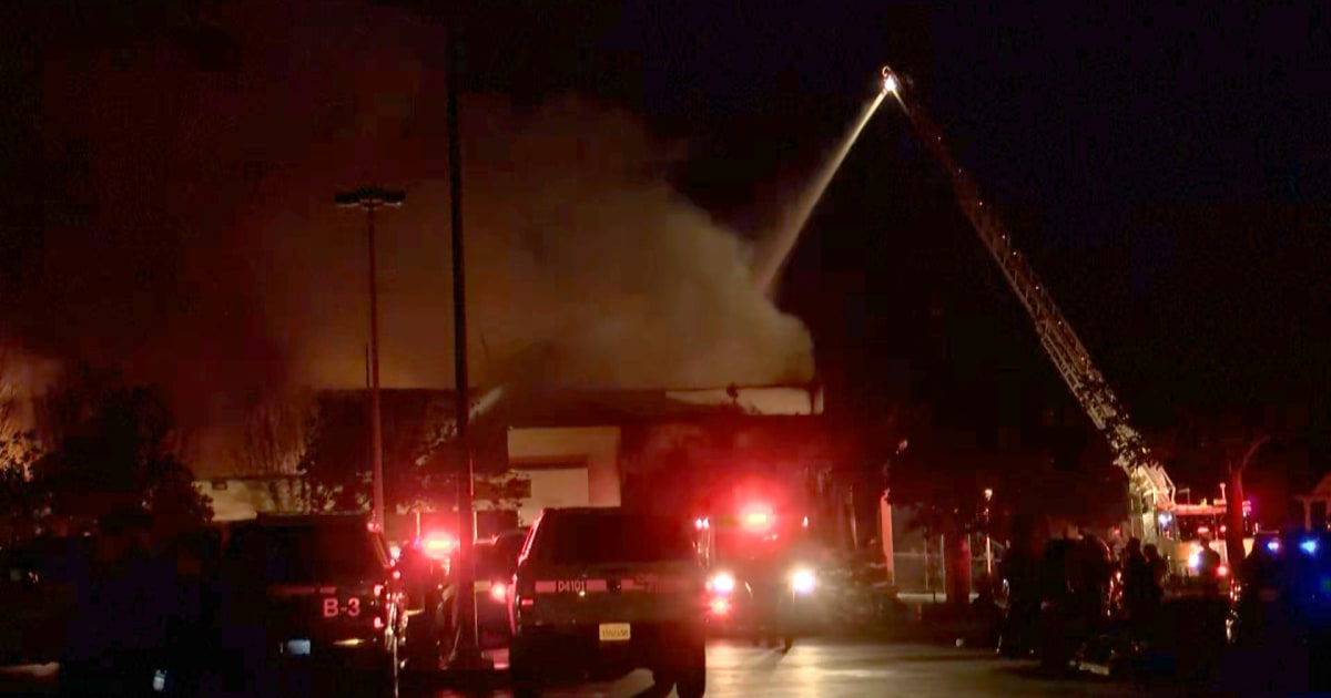 Massive blaze at California library leaves 1 firefighter dead, 1 missing