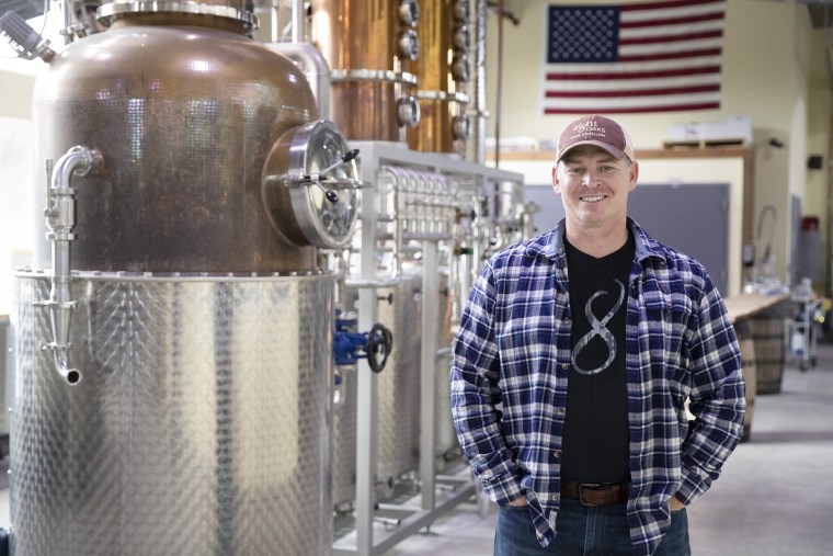 Image: Chad Butters, founder of Eight Oaks Farm Distillery, poses for a photo at their facility in New Tripoli