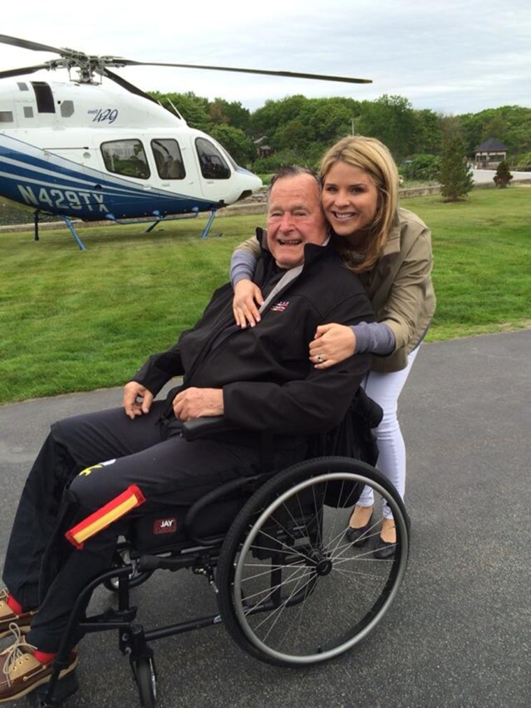 Jenna poses with her grandfather in 2014 before the former president went skydiving to celebrate his 90th birthday.