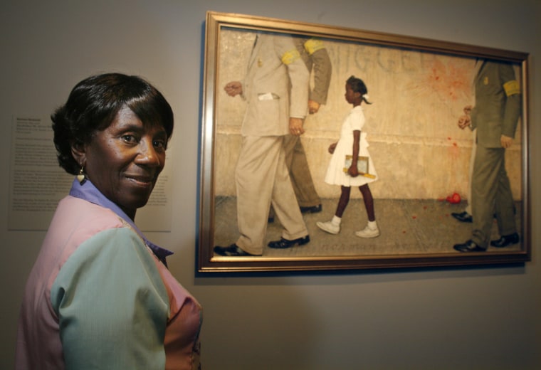 Image: Lucille Bridges looking at the original 1964 Norman Rockwell painting showing her daughter Ruby, "The Problem We All Live With," inside the Museum of Fine Arts in  Houston.