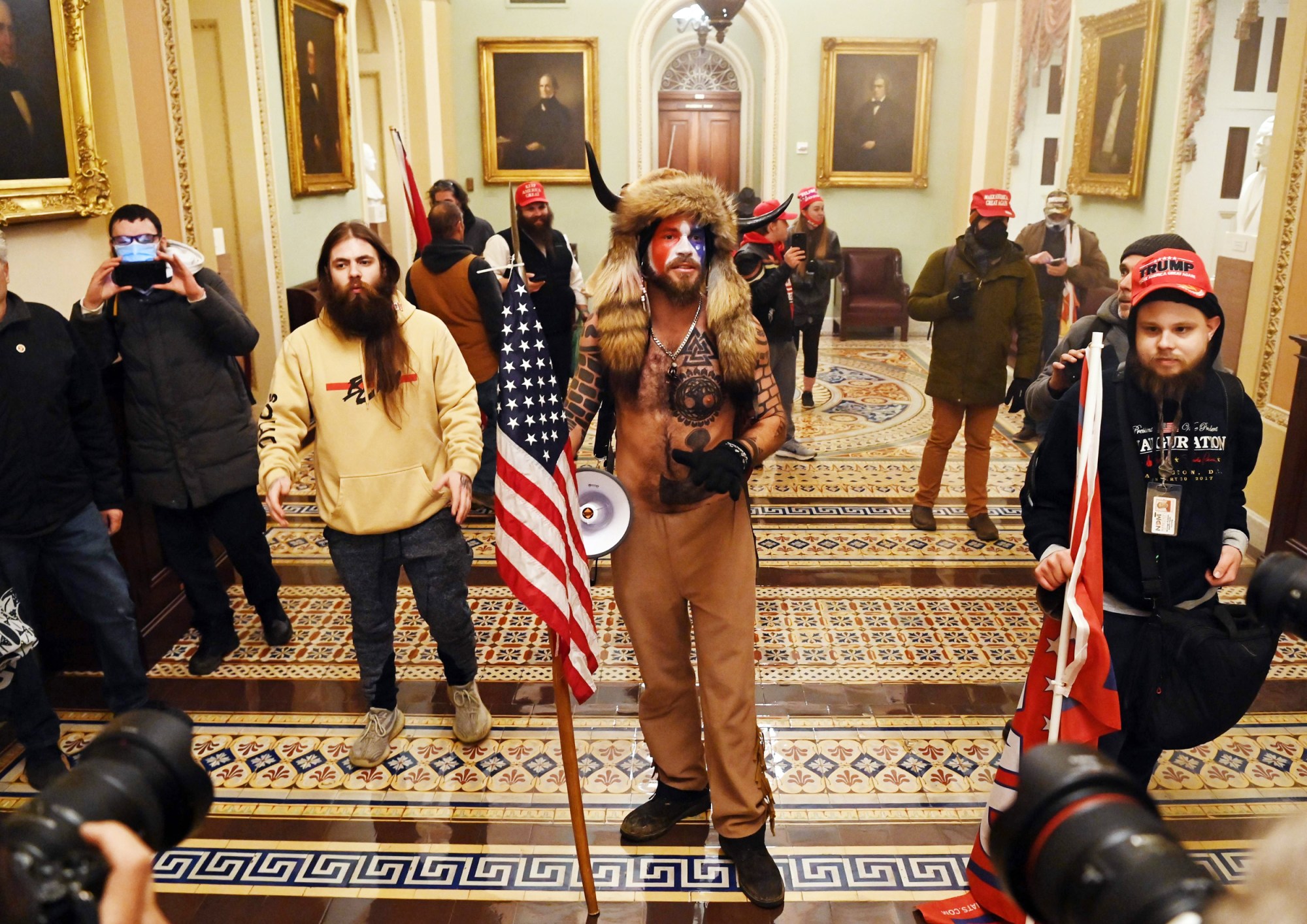 Trump-supporters pose for photos during US Capitol riot. January 6, 2021