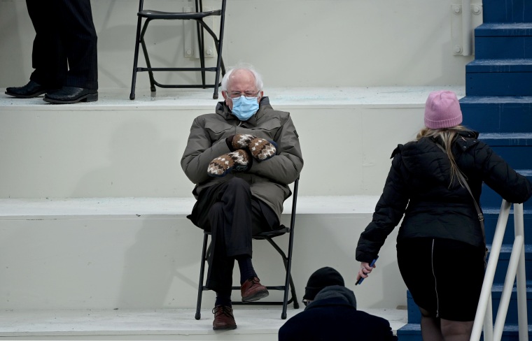Image: Sen. Bernie Sanders sits in the bleachers at the Capitol before the inauguration on Jan. 20, 2021.