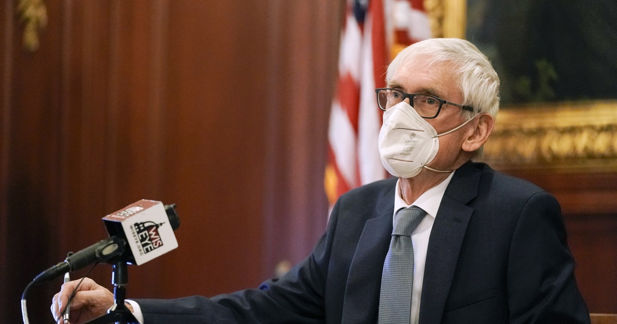 The Wisconsin legislature revoked the term of the governor Tony Evers mask.  He issued a new one.