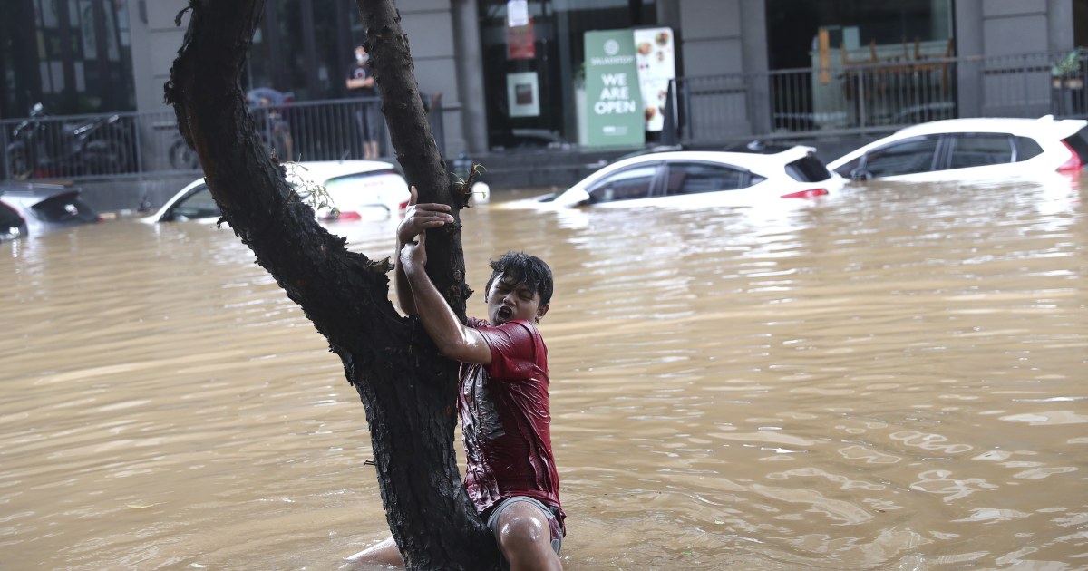 Hundreds of people are forced to evacuate as monsoon floods hit Indonesia’s capital, Jakarta
