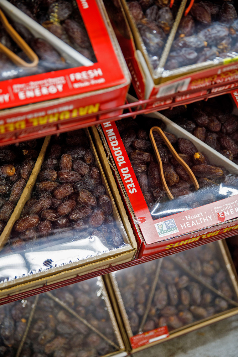 Boxes of dates, a fixture of nightly iftar meals during the holy month of Ramadan, are displayed in the halal grocery store Fertile Crescent in Brooklyn, N.Y., on May 5, 2021.